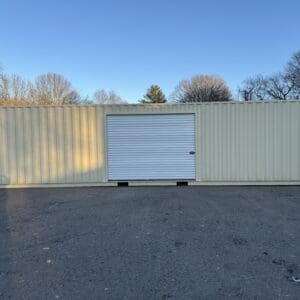 40′ x 8′ x 9.5′ Tall –NEW “One Trip” **W/ 10' ROLL DOOR INSTALLED**– High Cube Shipping/Storage Container – Wind and Watertight-BEIGE